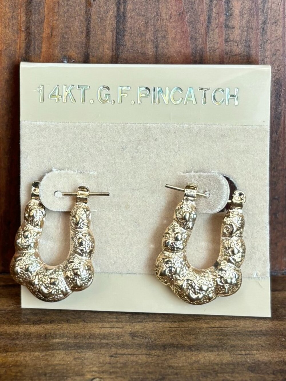 Gold Tone Textured U Hoop Earrings on 14KT GF Pincatch Display Card